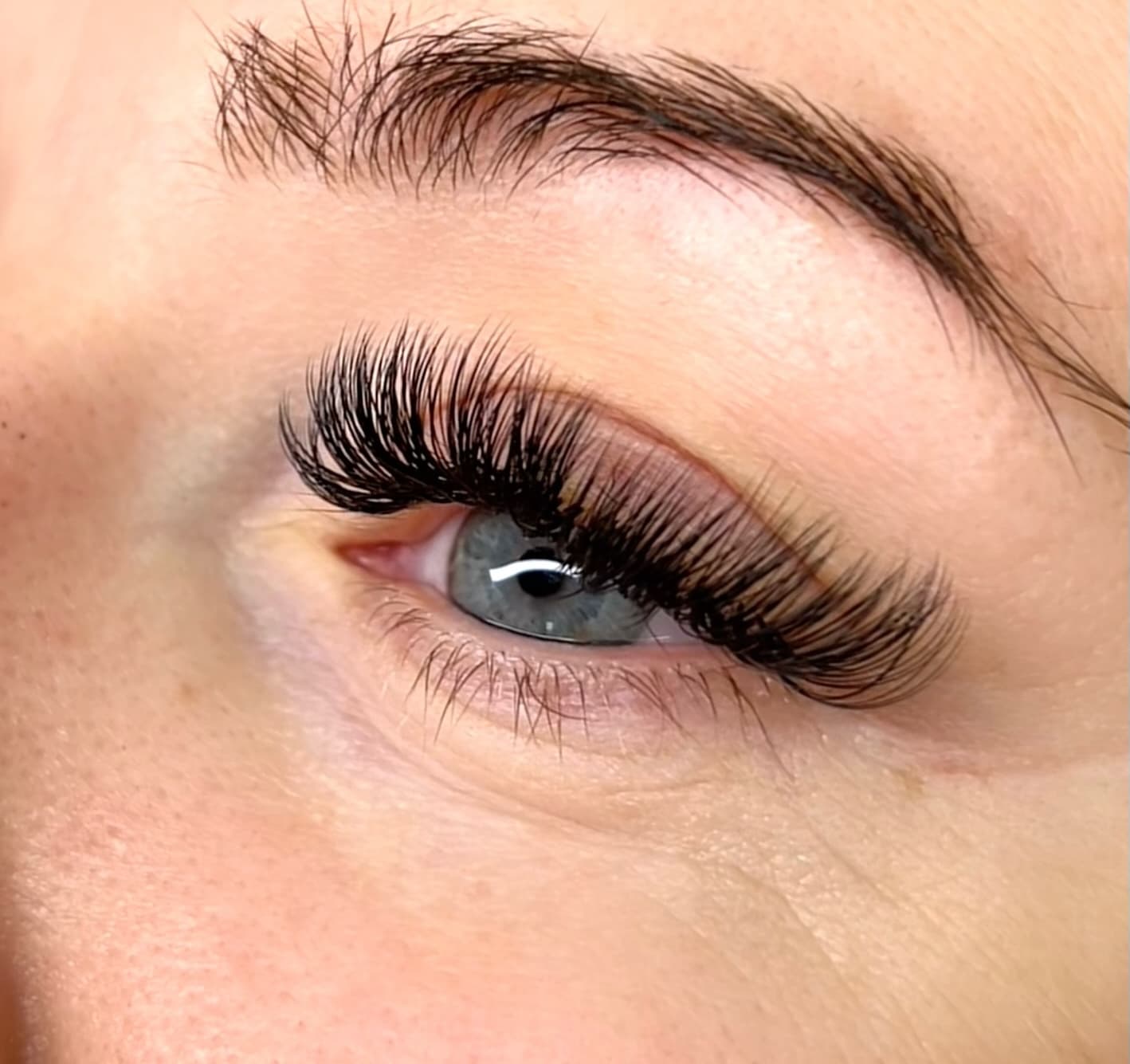 Wispy hybrid lash extensions by TN Lashes & Beauty